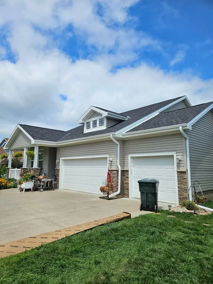 Ranch-style home with new gutters installed